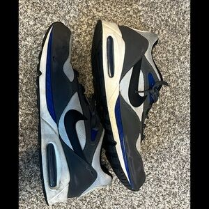 Nike Black and Gray Sneakers with Blue Accents
